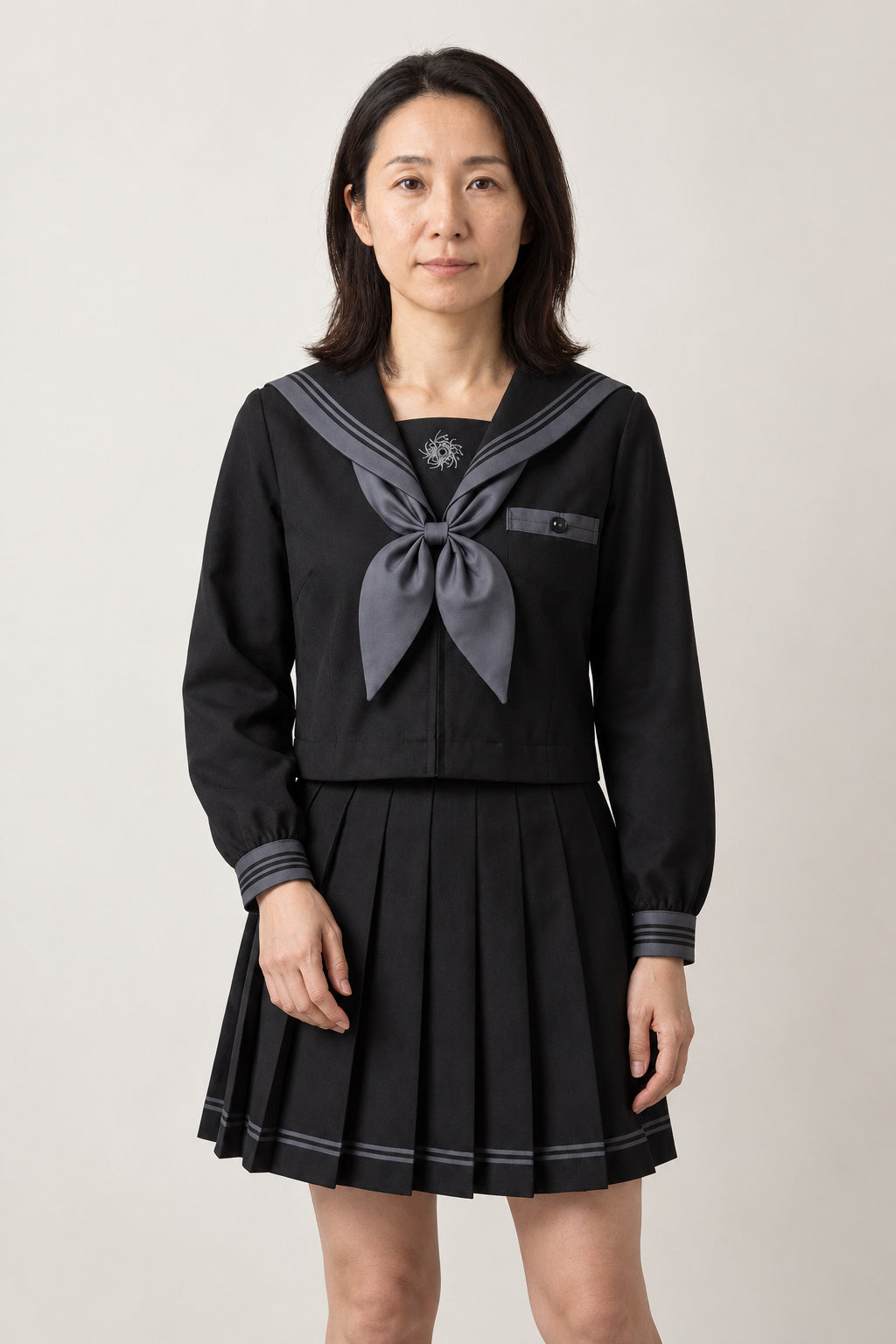 All Black Seifuku Set 'Yamiyo' – all black long sleeve sailor top with grey trim and scarf tie and black pleated skirt, Japanese school uniform seifuku set, sailor top and pleated skirt, front view on model