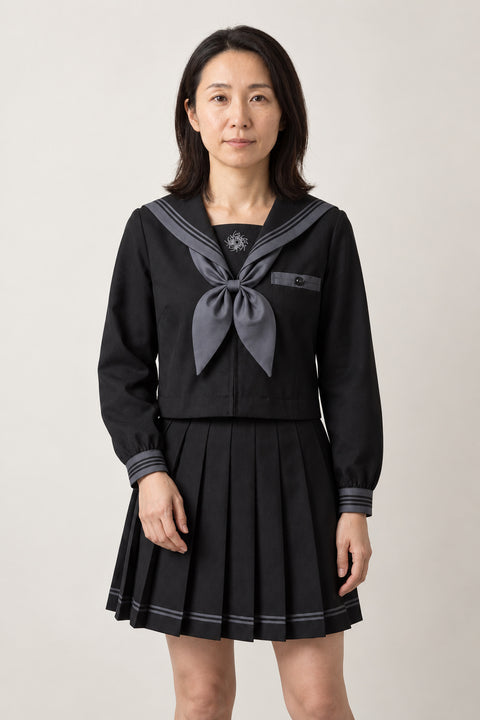 All Black Seifuku Set 'Yamiyo' – all black long sleeve sailor top with grey trim and scarf tie and black pleated skirt, Japanese school uniform seifuku set, sailor top and pleated skirt, front view on model