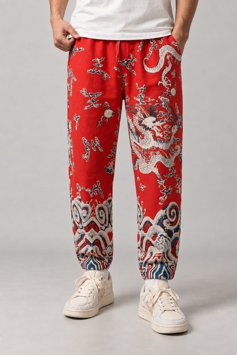 All Over Dragon Print Joggers 'Watatsumi' – red version of the all over dragon print joggers, front view on model