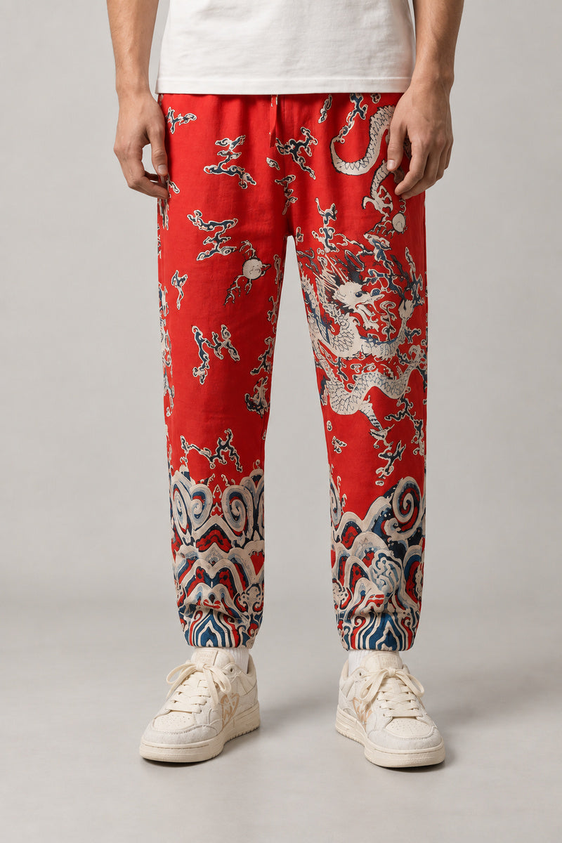 All Over Dragon Print Joggers 'Watatsumi' – red all over dragon print joggers, front view on model