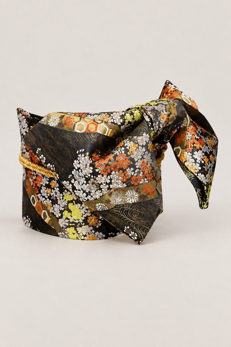 Autumn Bloom Obi Belt 'Akikusa' – black brocade obi with autumn flowers and gold hexagon lattice and gold cord, wide pre-tied brocade obi belt with sewn bow for women's kimono or yukata, studio view