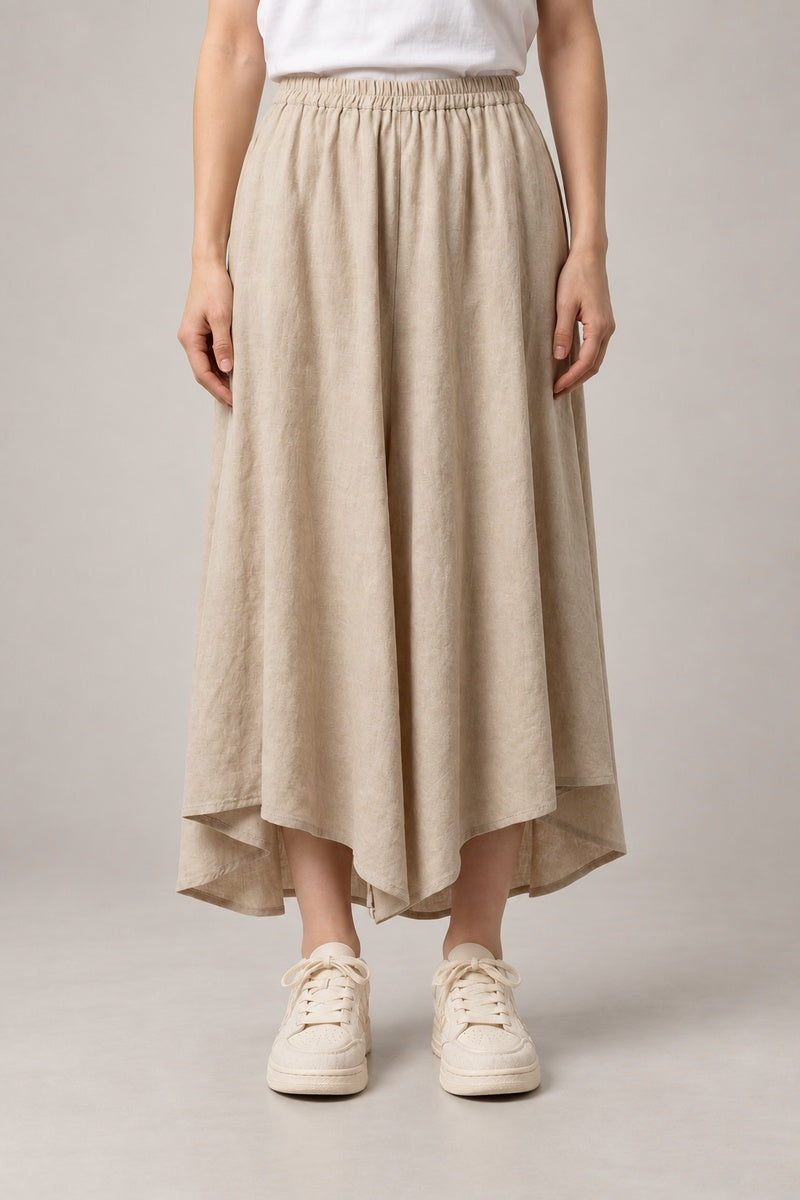 Beige Midi Hakama Skirt 'Torinoko' – beige midi hakama skirt with elastic waist and asymmetric hem, women's Japanese linen-look skirt, front view on model