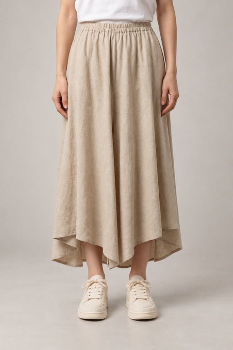Beige Midi Hakama Skirt 'Torinoko' – beige midi hakama skirt with elastic waist and asymmetric hem, women's Japanese linen-look skirt, front view on model