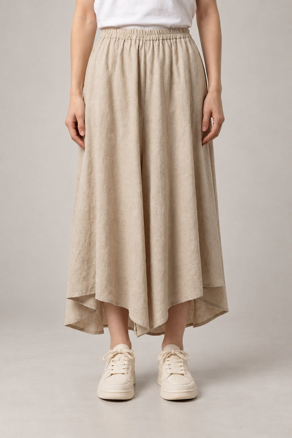 Beige Midi Hakama Skirt 'Torinoko' – beige midi hakama skirt with elastic waist and asymmetric hem, women's Japanese linen-look skirt, front view on model