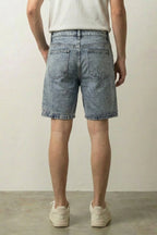 Big Star Patchwork Denim Shorts 'Hoshigata' – back view on model, studio