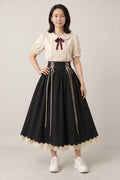 Black Formal Blouse Skirt Set 'Kokutan' – cream puff sleeve blouse with ribbon and black corset-laced full skirt with lace hem, Japanese style formal two-piece, front view on model