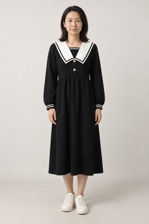 Black Japanese Sailor Dress 'Shiroeri' – black long sleeve sailor collar midi dress with white trim, Japanese seifuku style dress, front view on model