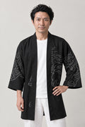 Black Line Tiger Happi Coat 'Sumitora' – black happi coat with white line tiger print on the sleeves, Japanese happi coat, unisex festival jacket, front view on model