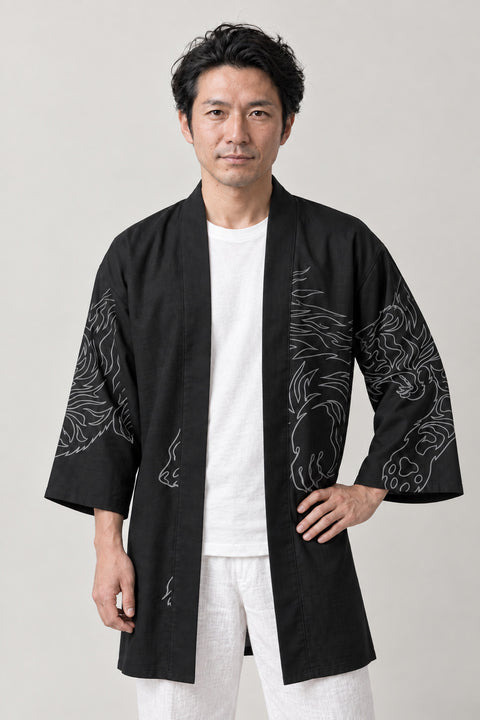 Black Line Tiger Happi Coat 'Sumitora' – black happi coat with white line tiger print on the sleeves, Japanese happi coat, unisex festival jacket, front view on model