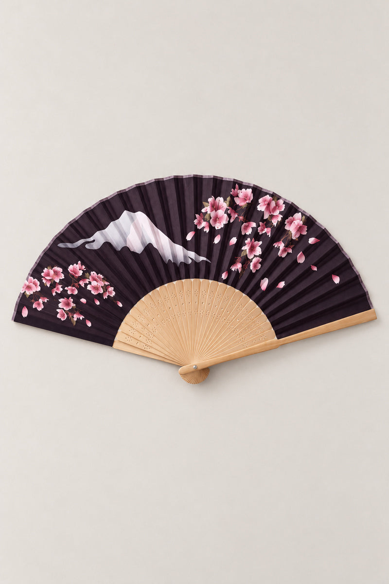 Black Sakura Folding Fan 'Yoruzakura' – folding fan printed with pink cherry blossom over Mount Fuji on a black ground, Japanese folding sensu fan with bamboo ribs, open, studio view