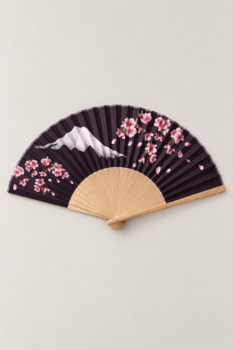 Black Sakura Folding Fan 'Yoruzakura' – folding fan printed with pink cherry blossom over Mount Fuji on a black ground, Japanese folding sensu fan with bamboo ribs, open, studio view