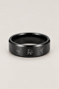 Black Sanskrit Ring for Men 'Bonji' – slim black stainless steel band ring engraved with Sanskrit mantra letters, men's Japanese ring, studio view