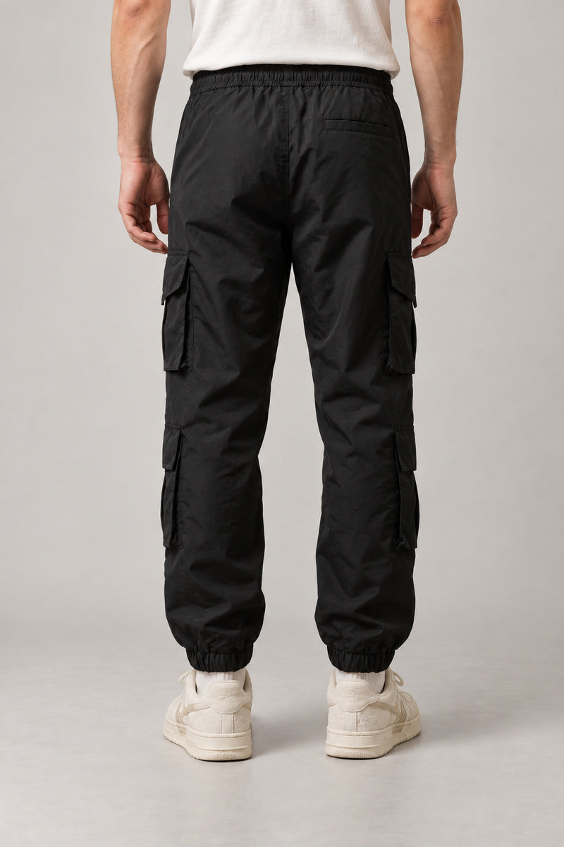 Black Techwear Cargo Pants 'Kageboshi' – back view of the black techwear cargo pants