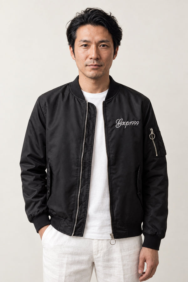 Blue Dragon Embroidered Jacket 'Seiran' – black bomber jacket with small embroidered Japan lettering, Japanese streetwear, front view on model