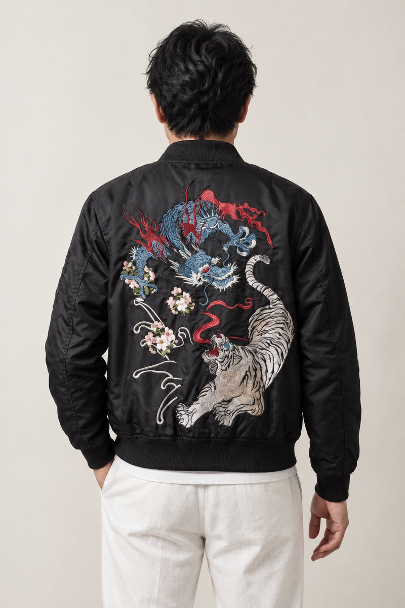 Blue Dragon Embroidered Jacket 'Seiran' – back view of black bomber jacket showing the embroidered blue dragon and phoenix