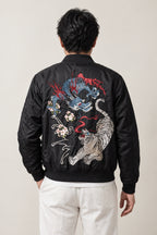 Blue Dragon Embroidered Jacket 'Seiran' – back view of black bomber jacket showing the embroidered blue dragon and phoenix