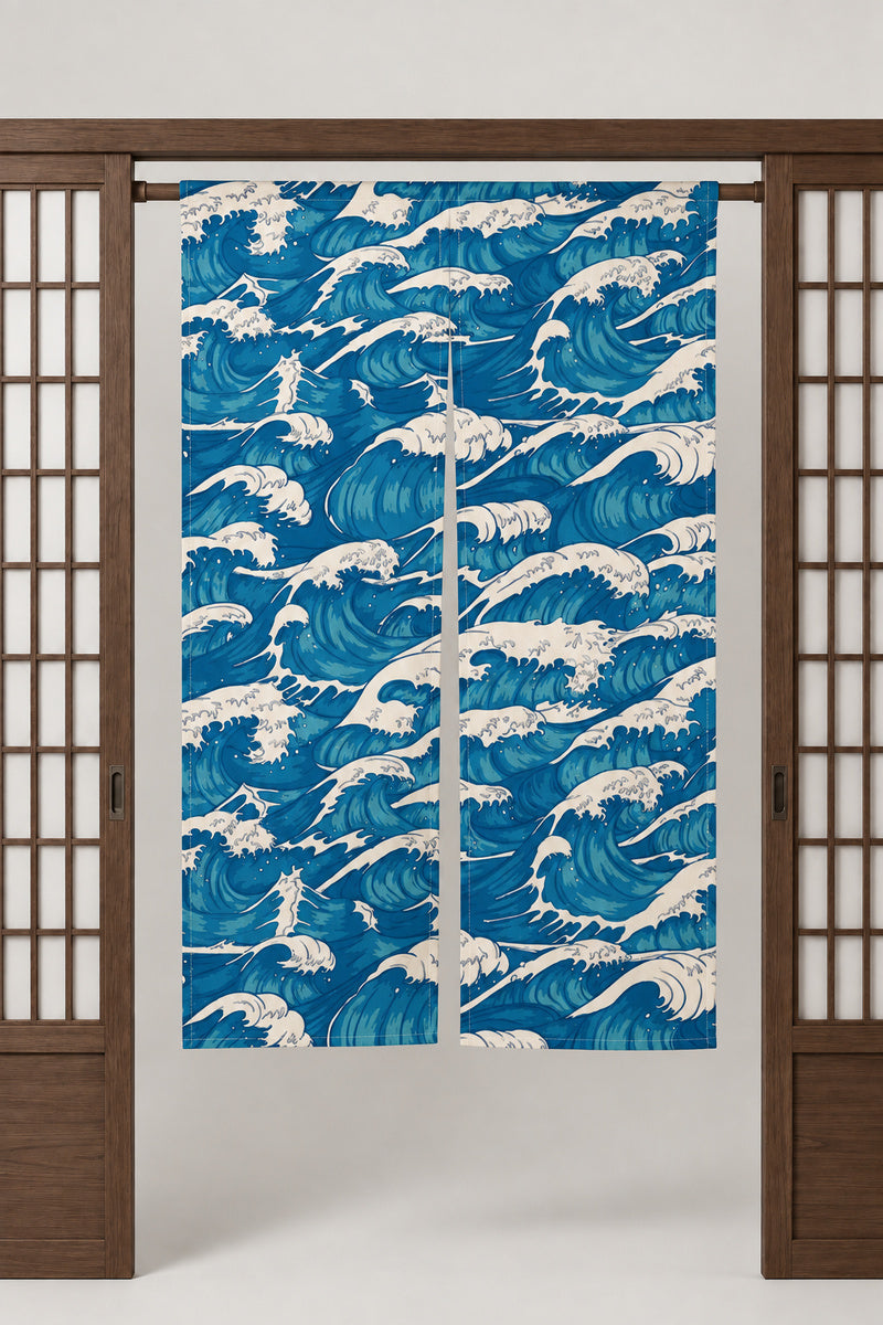 Blue Ocean Wave Noren 'Araumi' – bright blue noren with rolling waves and white foam, split Japanese noren door curtain hung on a rod between sliding screens, studio view