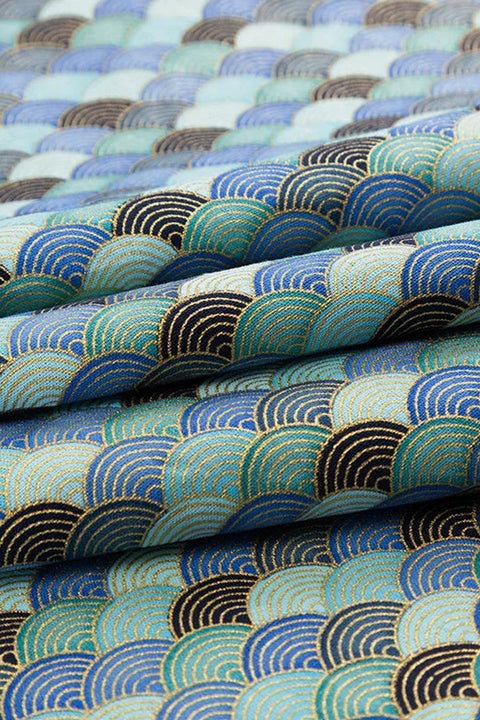 Blue Seigaiha Japanese Furoshiki 'Seinami' – furoshiki printed with seigaiha wave pattern in blues and teal outlined in gold, Japanese furoshiki wrapping cloth 50 by 145 cm, close-up of the print