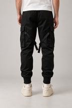 Buckle Strap Techwear Joggers 'Kusari' – back view of the black buckle strap techwear joggers
