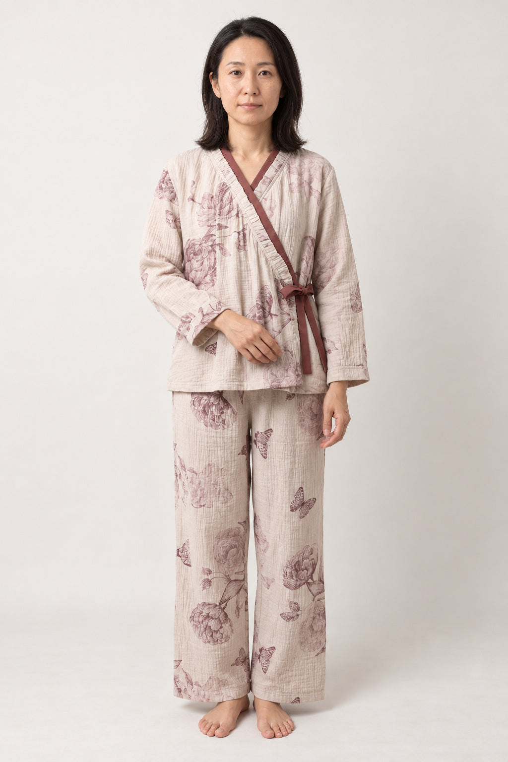 Butterfly Garden Sleep Set 'Botanchou' – cream women's sleep set with butterfly and peony print and side-tie top, Japanese style pyjamas, front view on model