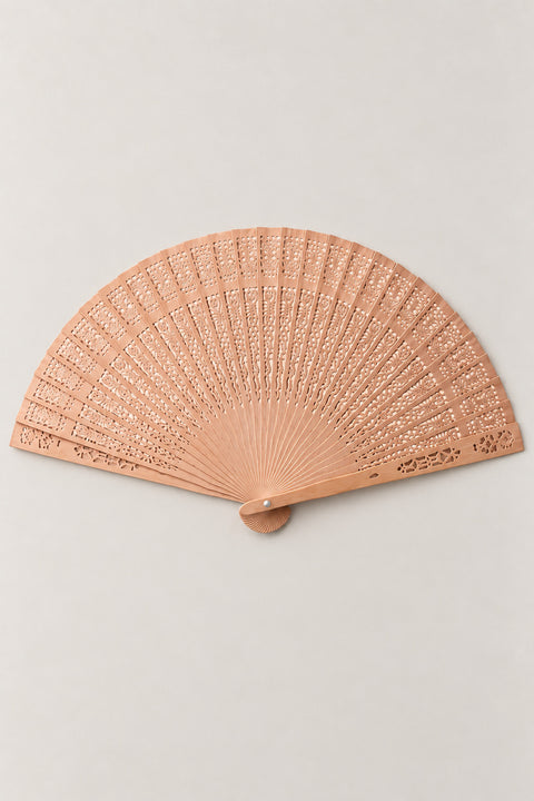 Carved Bamboo Fan 'Sukashi' – carved wooden folding fan with open lattice cut through every rib, no leaf, Japanese openwork fan, studio view
