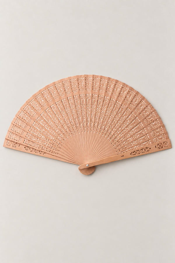 Carved Bamboo Fan 'Sukashi' – carved wooden folding fan with open lattice cut through every rib, no leaf, Japanese openwork fan, studio view