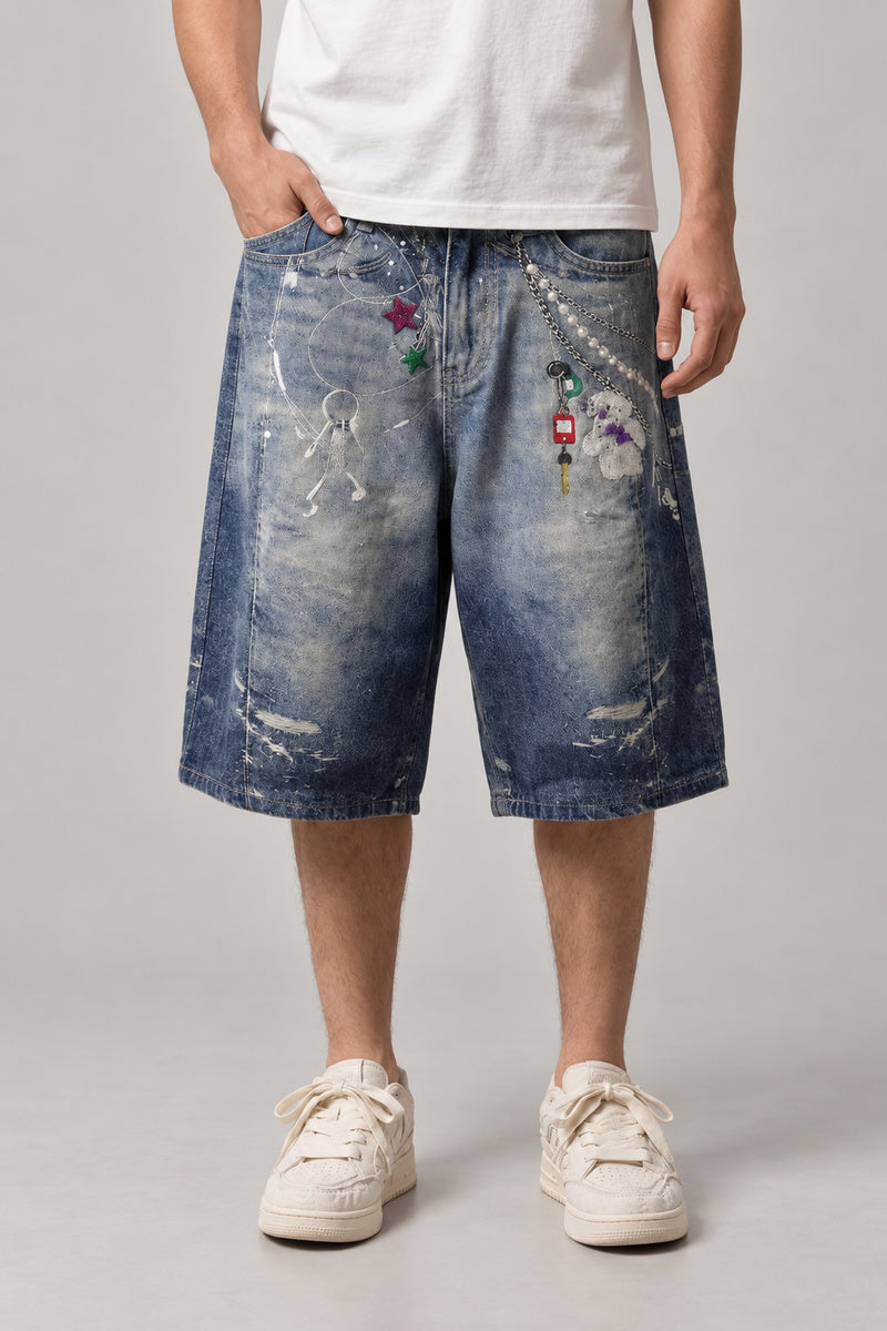 Chain Print Baggy Denim Shorts 'Kusarimon' – blue washed baggy denim shorts with chain, charm and star print, Japanese streetwear shorts, front view on model
