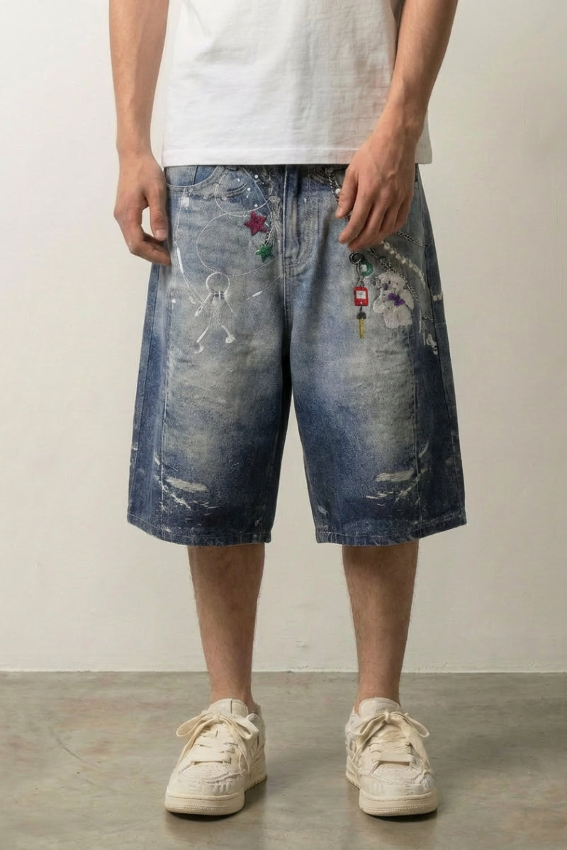 Chain Print Baggy Denim Shorts 'Kusarimon' – blue washed baggy denim shorts with chain, charm and star print, front view on model, studio