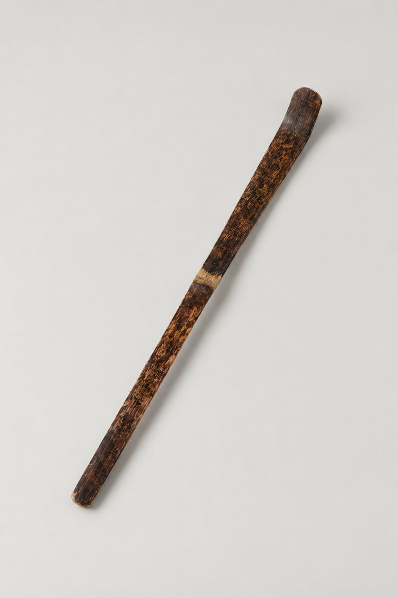 Chashaku 'Takesaji' – dark smoked bamboo chashaku matcha scoop bent at the tip, Japanese tea ceremony spoon, studio view