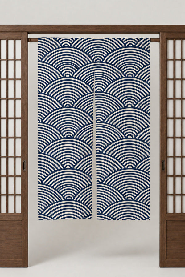 Classic Seigaiha Noren 'Seikai' – cream noren with classic seigaiha wave pattern in navy line, split Japanese noren door curtain hung on a rod between sliding screens, studio view