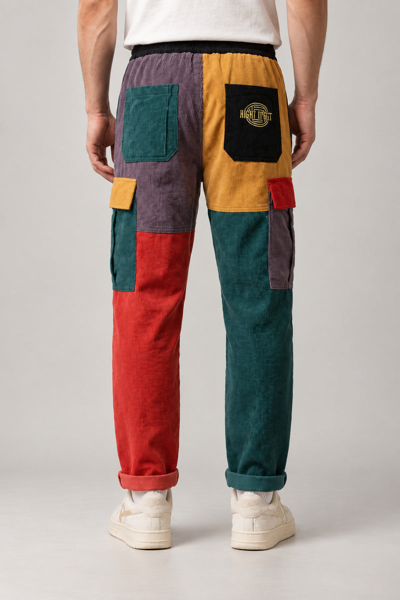 Colour Block Patchwork Trousers 'Tsugiki' – back view of the colour block patchwork trousers showing yellow and red panels