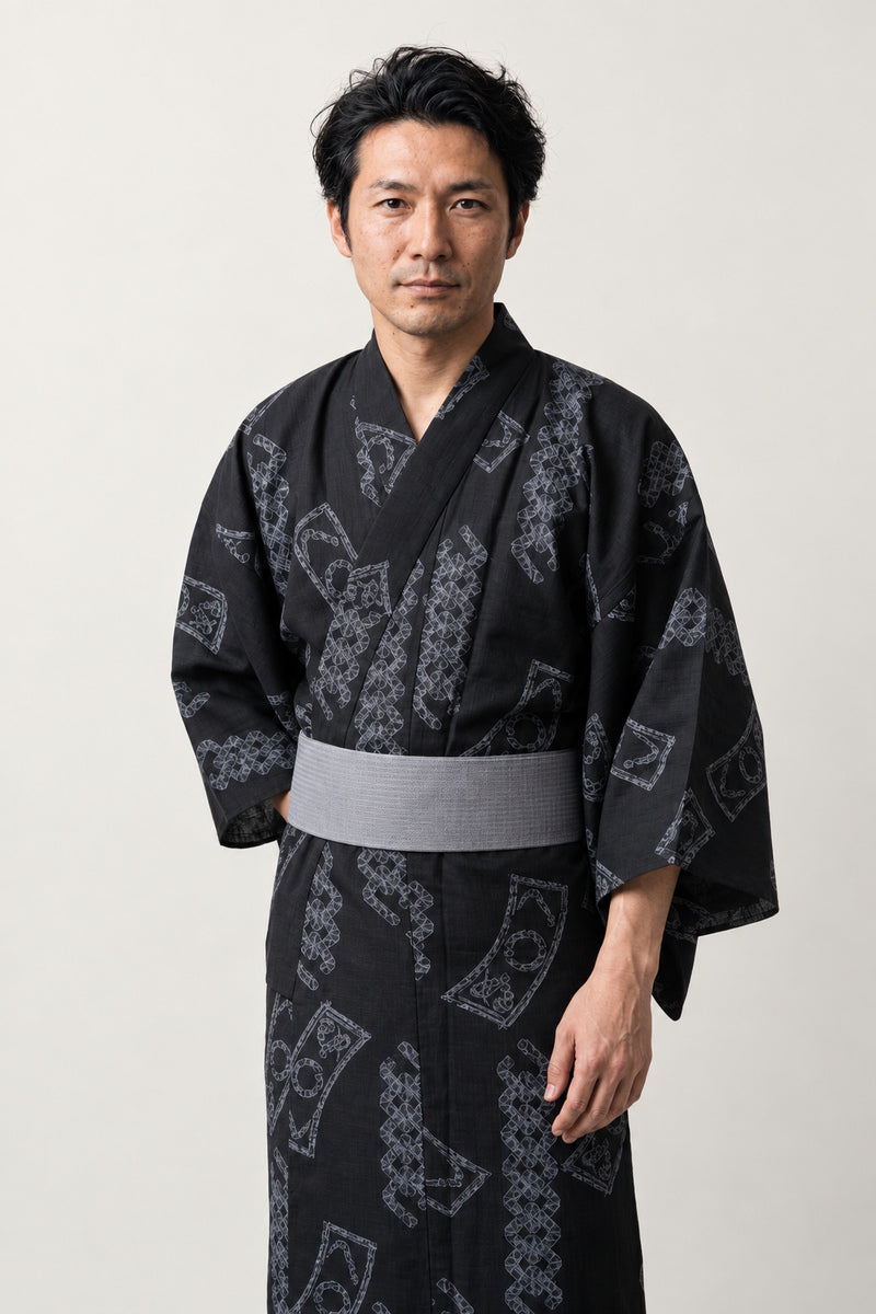 Cord Pattern Kimono 'Kumihimo' – black men's kimono with grey braided cord and crest pattern and grey obi, Japanese yukata robe, front view on model