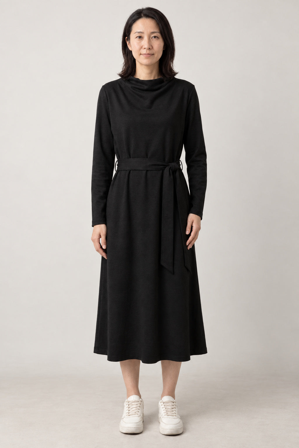 Cowl Neck Japanese Winter Dress 'Fuyugomori' – black version of the cowl neck long sleeve winter dress with tie belt, front view on model