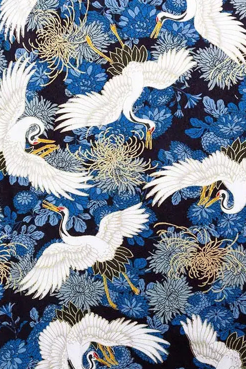 Crane Chrysanthemum Furoshiki 'Tsurugiku' – navy furoshiki printed with white cranes over blue chrysanthemums, Japanese furoshiki wrapping cloth 50 by 145 cm, close-up of the print