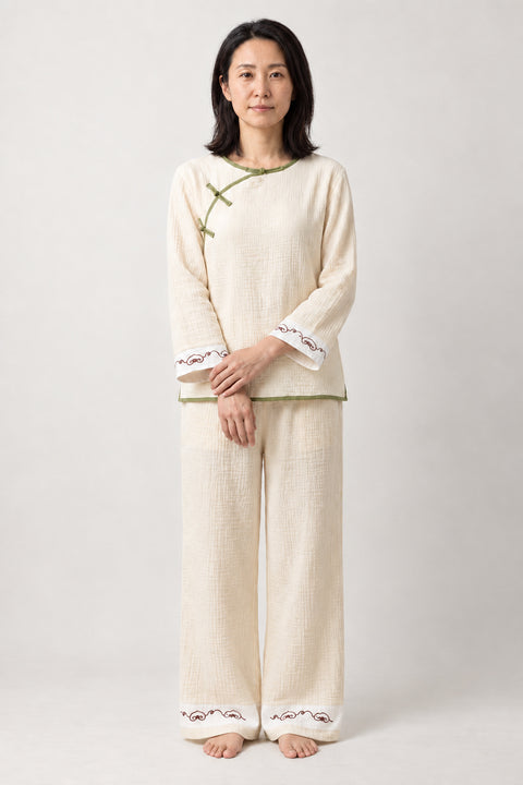 Cream Japanese Style Pajamas 'Yutori' – cream women's Japanese style pyjama set with knot buttons, loungewear top and trousers, front view on model