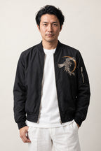 Crescent Moon Phoenix Bomber 'Getsuei' – black bomber jacket with embroidered phoenix, Japanese streetwear souvenir jacket, front view on model