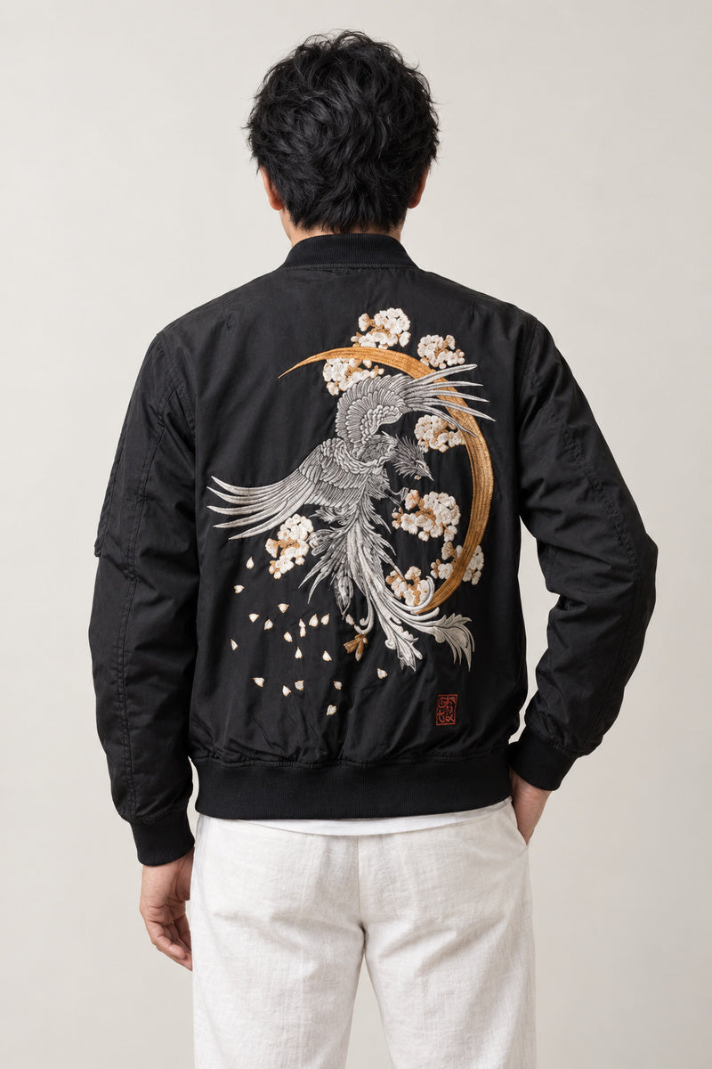 Crescent Moon Phoenix Bomber 'Getsuei' – back view of black bomber jacket showing the embroidered phoenix under a crescent moon with blossom