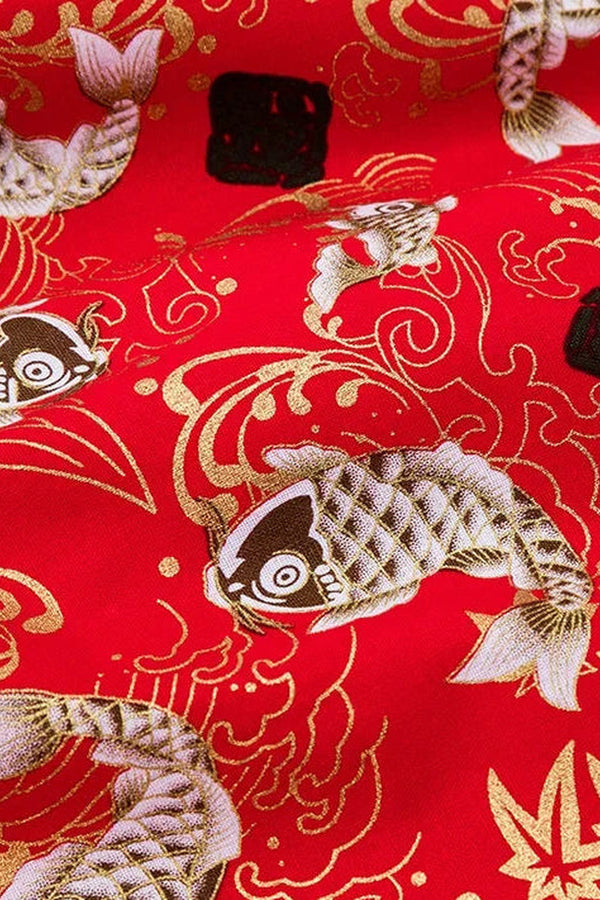 Crimson Koi Furoshiki 'Akagoi' – red furoshiki printed with koi carp, gold waves, maple leaves and black seals, Japanese furoshiki wrapping cloth 50 by 145 cm, close-up of the print