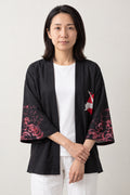 Crimson Peony Kimono Jacket 'Enji' – black women's kimono jacket with crimson peony and white crane print, Japanese haori style cardigan, front view on model