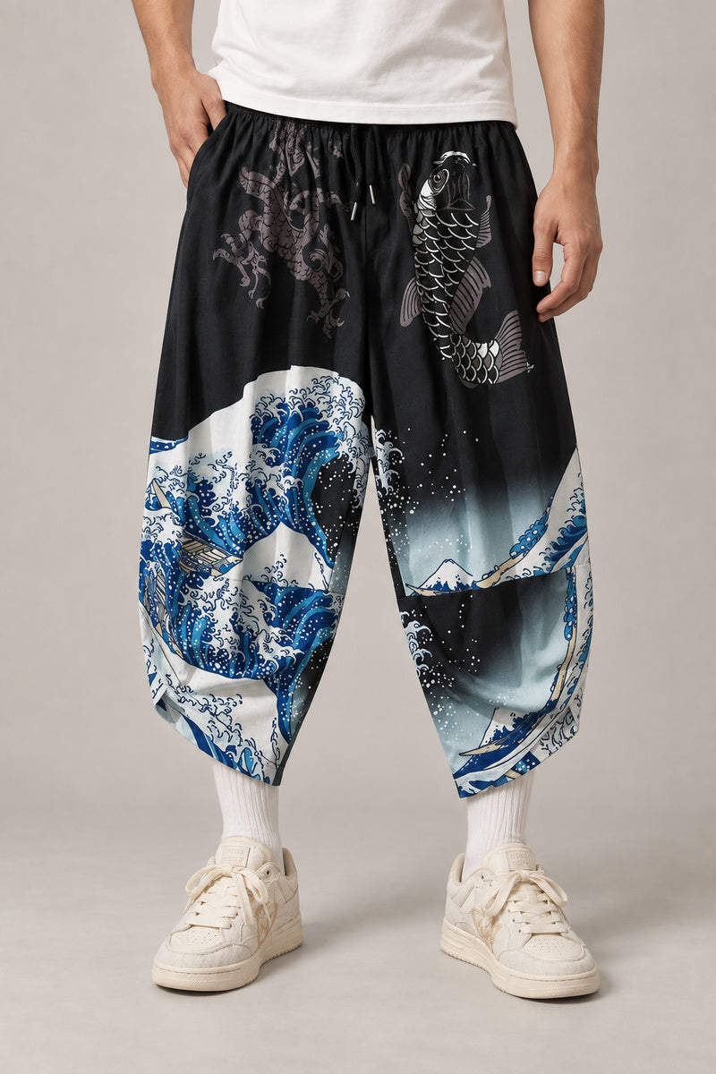 Cropped Japanese Print Pants 'Jukkei' – black cropped pants with great wave and koi, front view on model