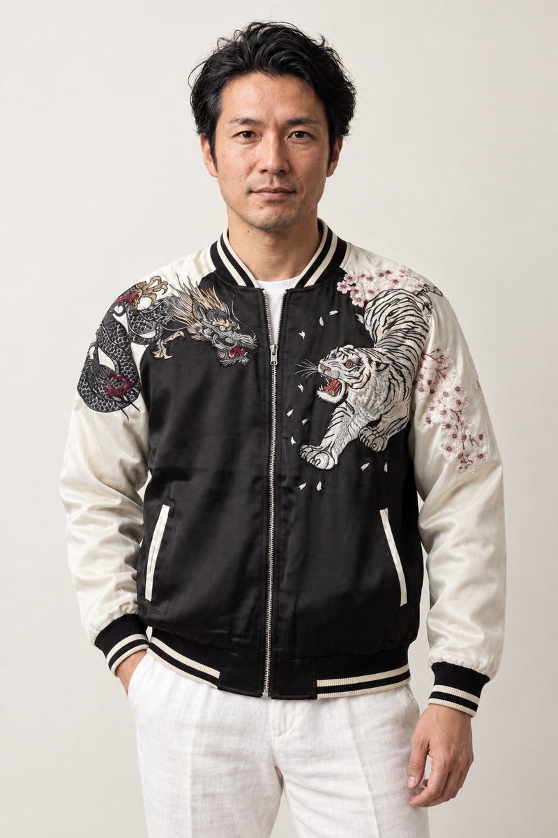 Diving Eagle Sukajan 'Owashi' – black and cream sukajan with embroidered tiger and eagle, Japanese sukajan souvenir bomber jacket, front view on model