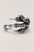 Dragon Claw Ring 'Tsume' – open stainless steel dragon claw ring with four scaled talons gripping the finger, Japanese dragon claw ring, studio view