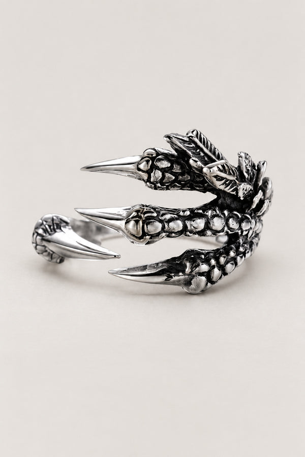 Dragon Claw Ring 'Tsume' – open stainless steel dragon claw ring with four scaled talons gripping the finger, Japanese dragon claw ring, studio view