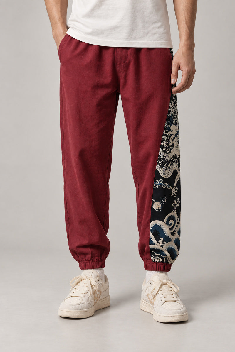 Dragon Panel Wide Leg Pants 'Tatsunami' – burgundy dragon panel wide leg pants, front view on model
