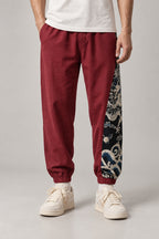 Dragon Panel Wide Leg Pants 'Tatsunami' – burgundy dragon panel wide leg pants, front view on model