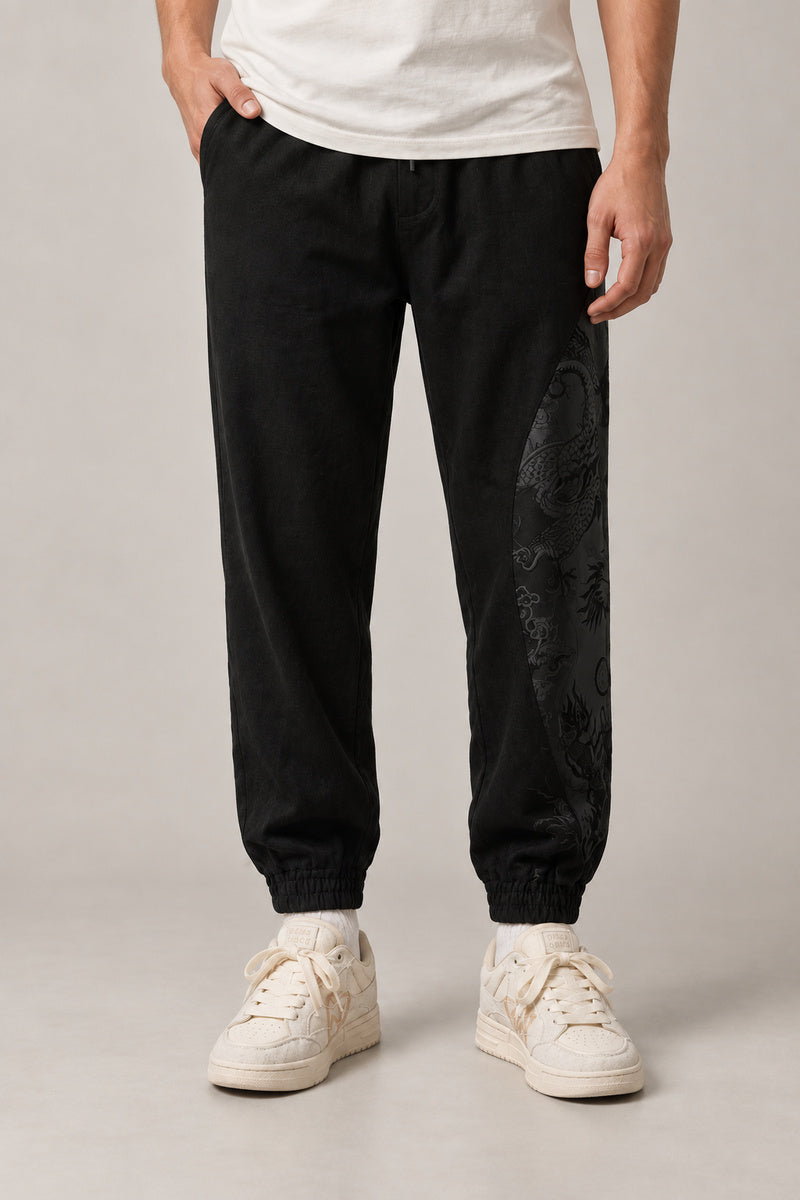 Dragon Panel Wide Leg Pants 'Tatsunami' – black dragon panel wide leg pants, side view on model