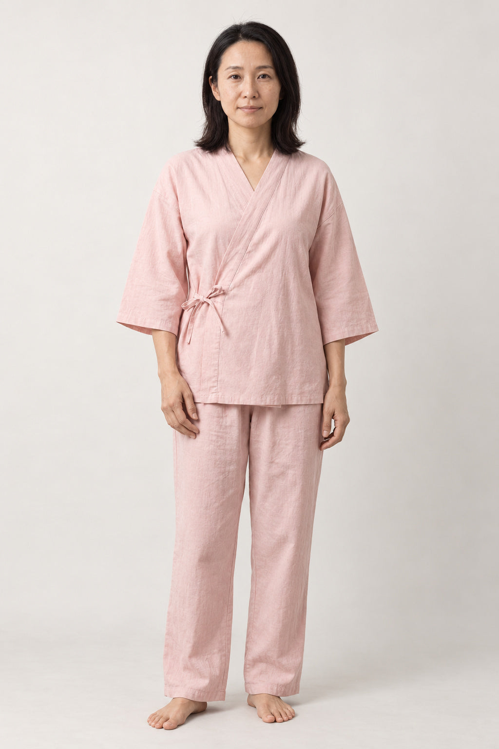 Dusty Pink Kimono Style Pyjamas 'Sakuyu' – dusty pink women's kimono style pyjamas with side-tie wrap top, jinbei loungewear set, front view on model