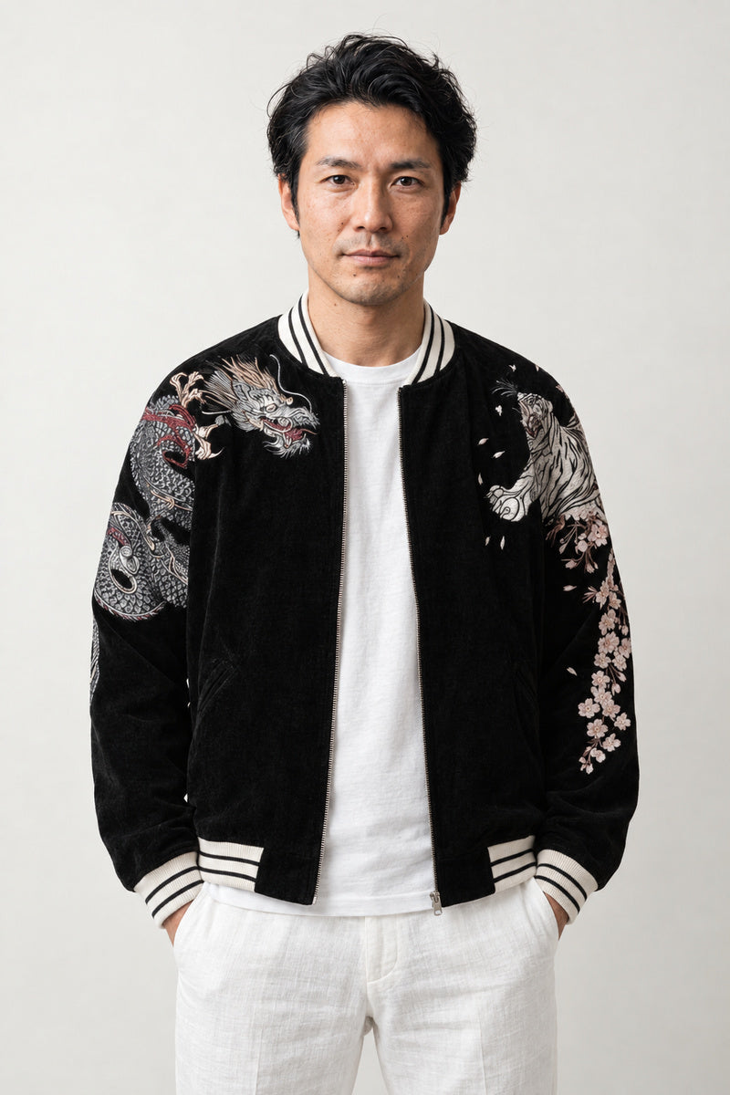 Eagle and Dragon Bomber Jacket 'Tenku' – black sukajan bomber jacket with embroidered dragon and cherry blossom, Japanese sukajan souvenir bomber jacket, front view on model