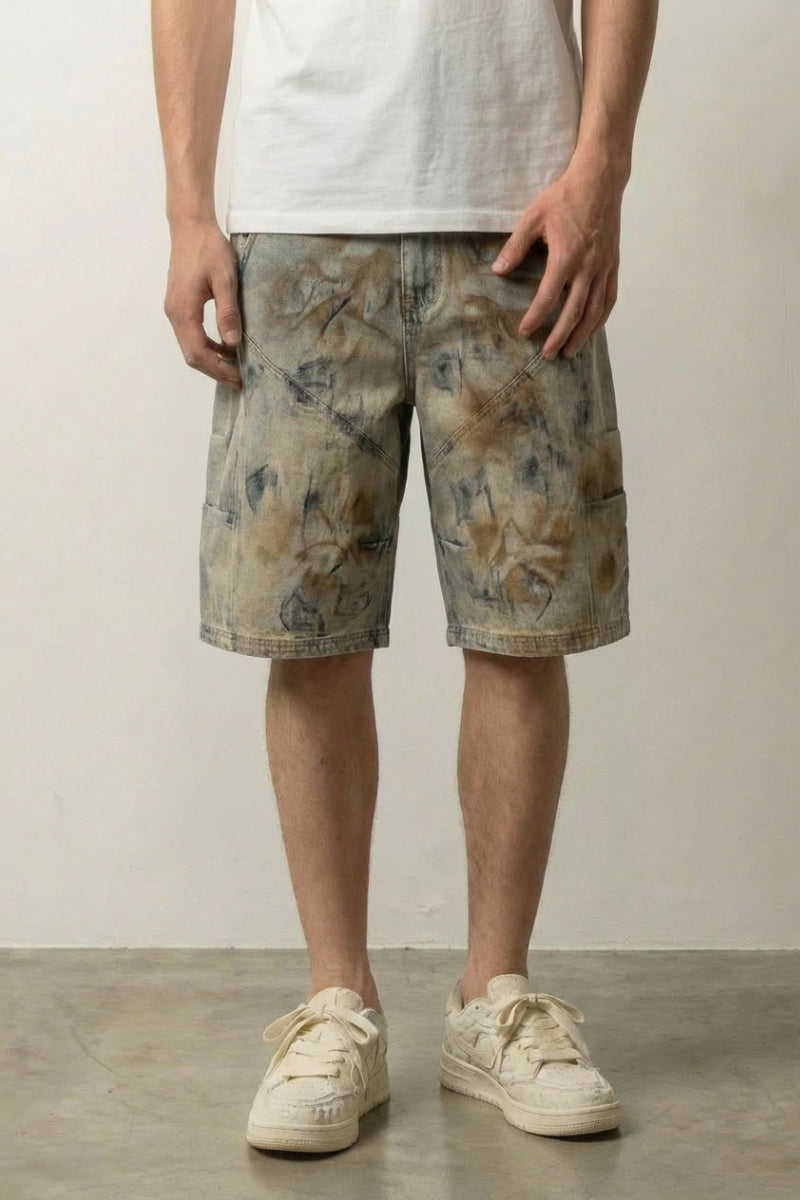 Faded Floral Acid Wash Shorts 'Nijimi' – beige faded floral acid wash denim shorts with wide leg, front view on model, studio