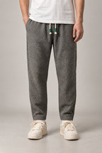 Flecked Grey Tapered Pants 'Sunago' – flecked grey tapered trousers with drawstring waist, Japanese streetwear pants, front view on model